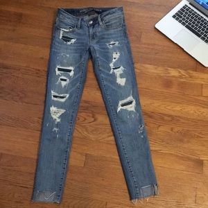 Ripped Medium Wash Destroyed Jeggings with Patches
